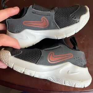 Nike Kids Black and White Sneakers with Red Swoosh